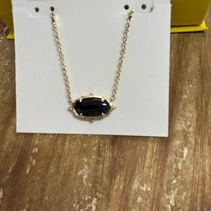 Kendra Scott Baroque Elisa gold pendant.